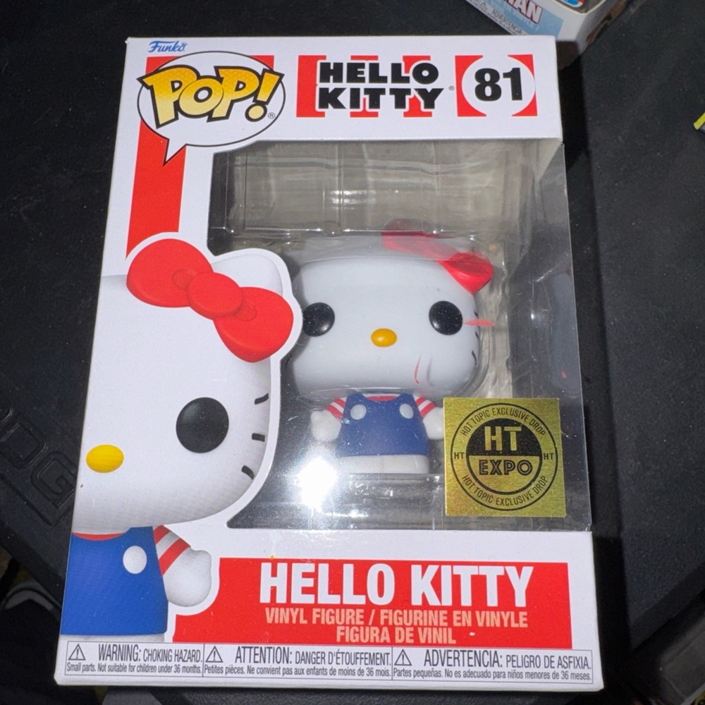 Funko Hello Kitty Vinyl Figure with Red Bow and Blue Outfit